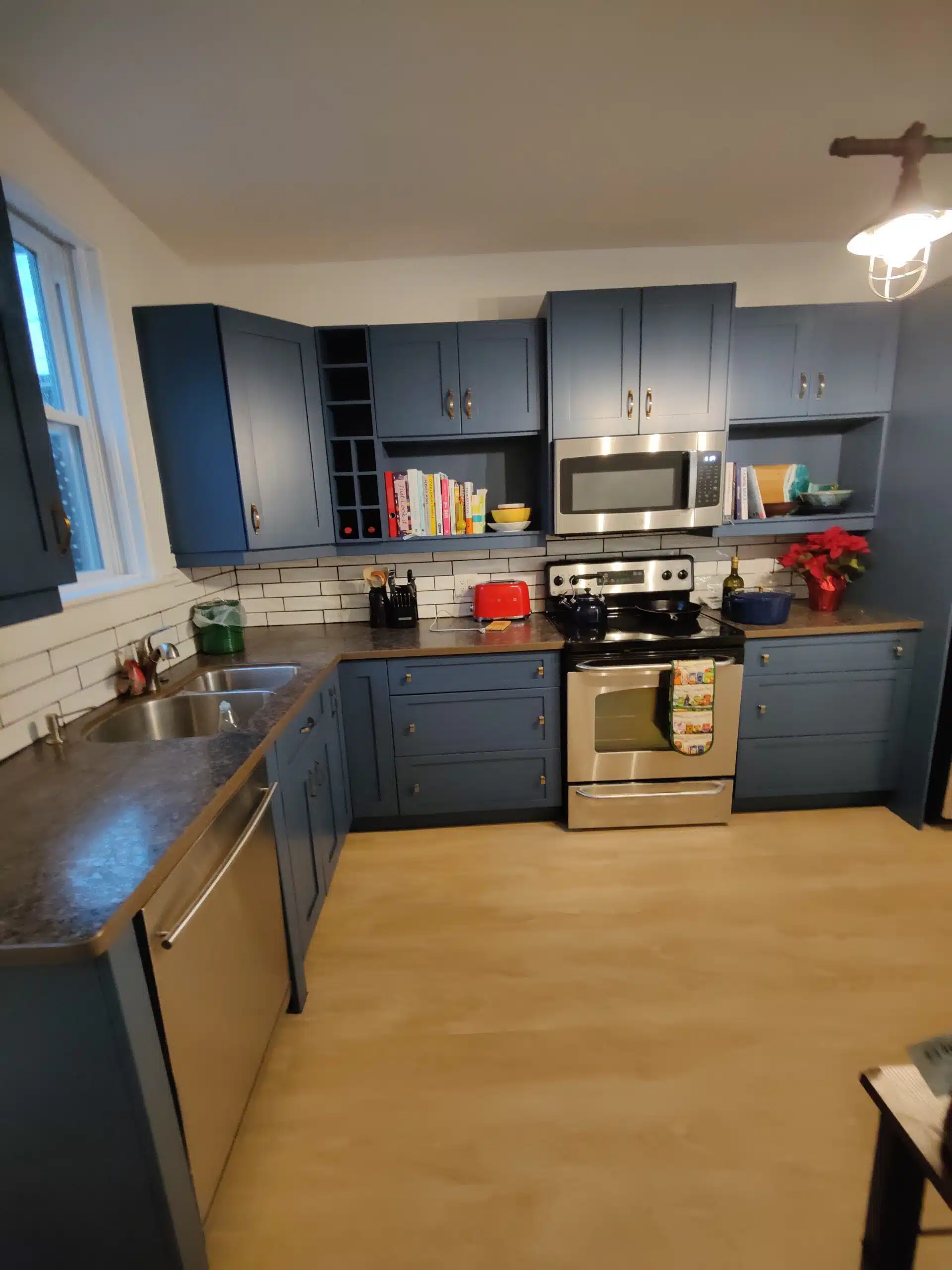 Achieve a stunning kitchen transformation with professional cabinet refinishing by The Goodbrush Painting Co.